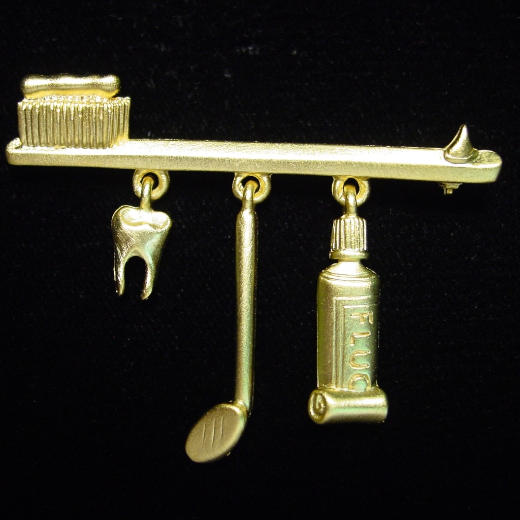 ‘Toothbrush With Charms' Dental Pin Brooch
